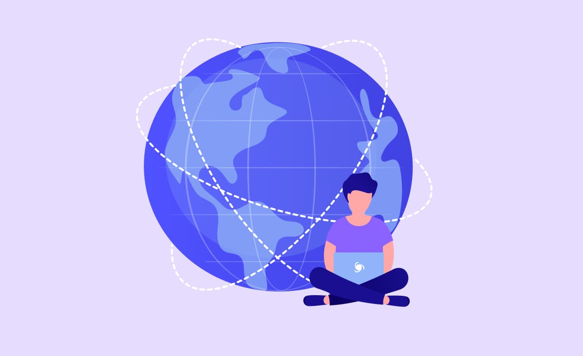 A man with a laptop is sitting in front of the globe searching for the web app development services. the globe is traversed by multiple dash lines representing different destinations for outsourcing.